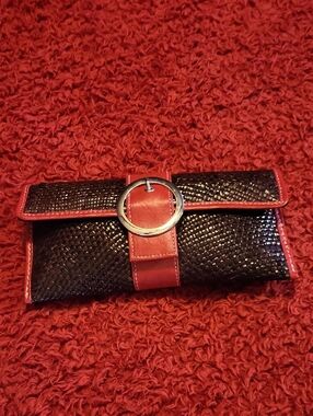Red-Trim Black Woven Clutch with Silver Ring Accent